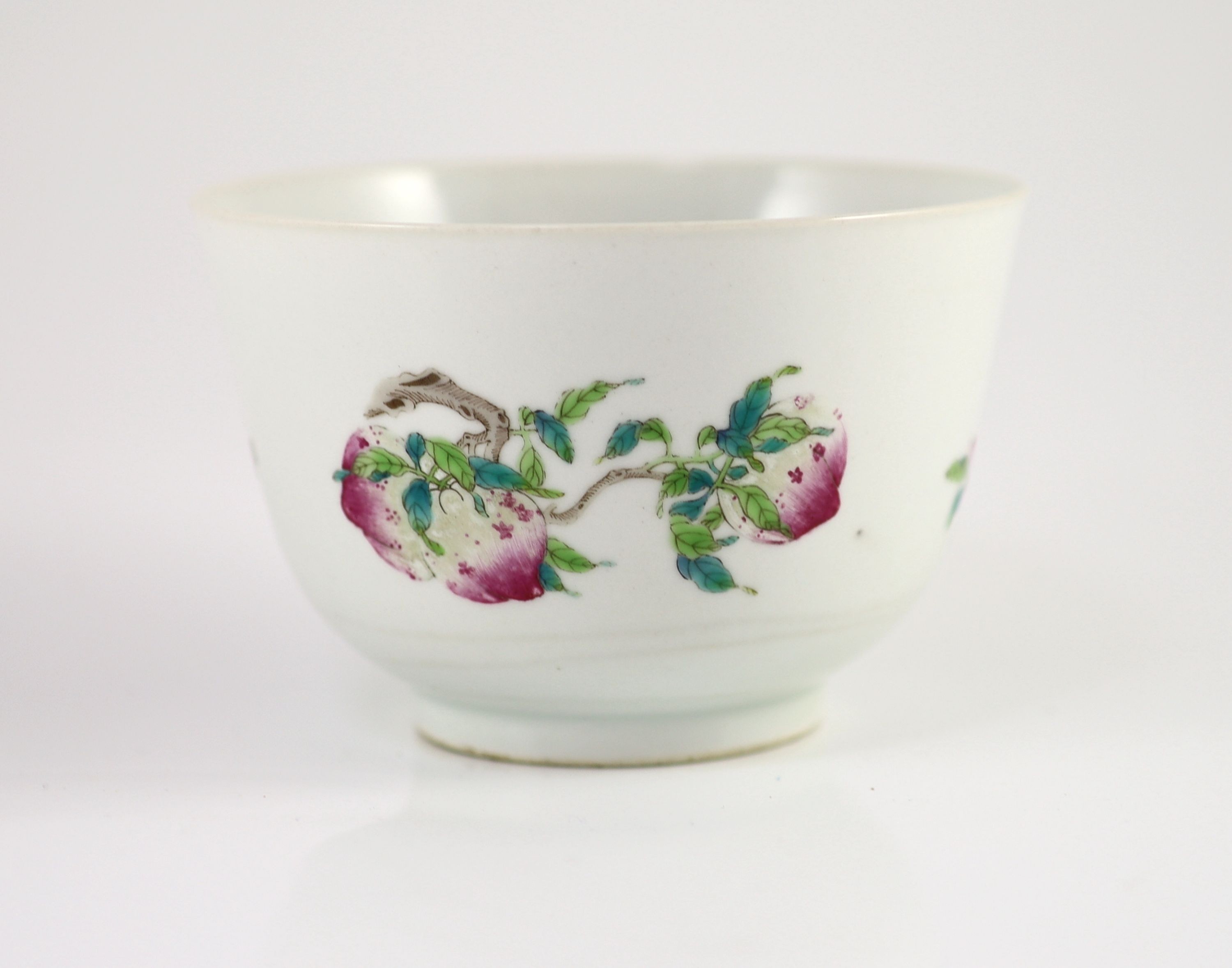 A Chinese famille rose ‘fruit sprig’ deep bowl, Qianlong mark but late 19th/early 20th century, 13cm diameter